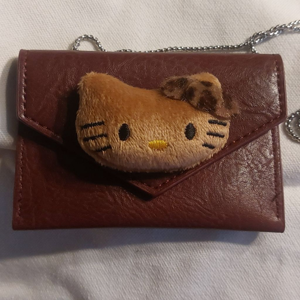 All you need is ID & 1 card. Crossbody Burgandy Brown Hello Kitty cardholder